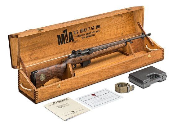 Anniversary Special Edition rifle with case, manual, sling, and cleaning kit.